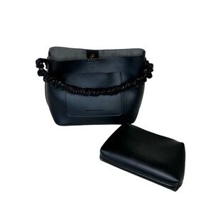 Melie Bianco Vegan Leather handbag.